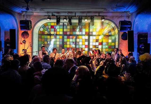 Dora Live Band performing at a stained glass venue in Amman, Jordan