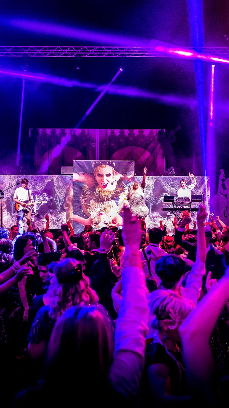 Dora Live Band on stage at the HUG retro-themed gala, Arena Geneva, Switzerland